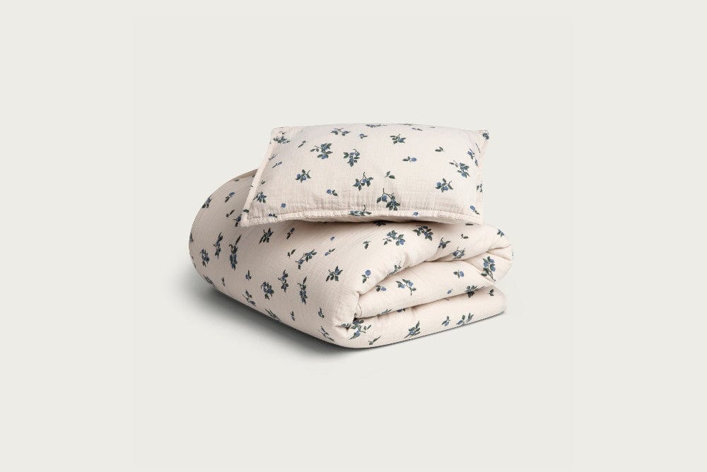 Folded cotton bedding with blueberry pattern