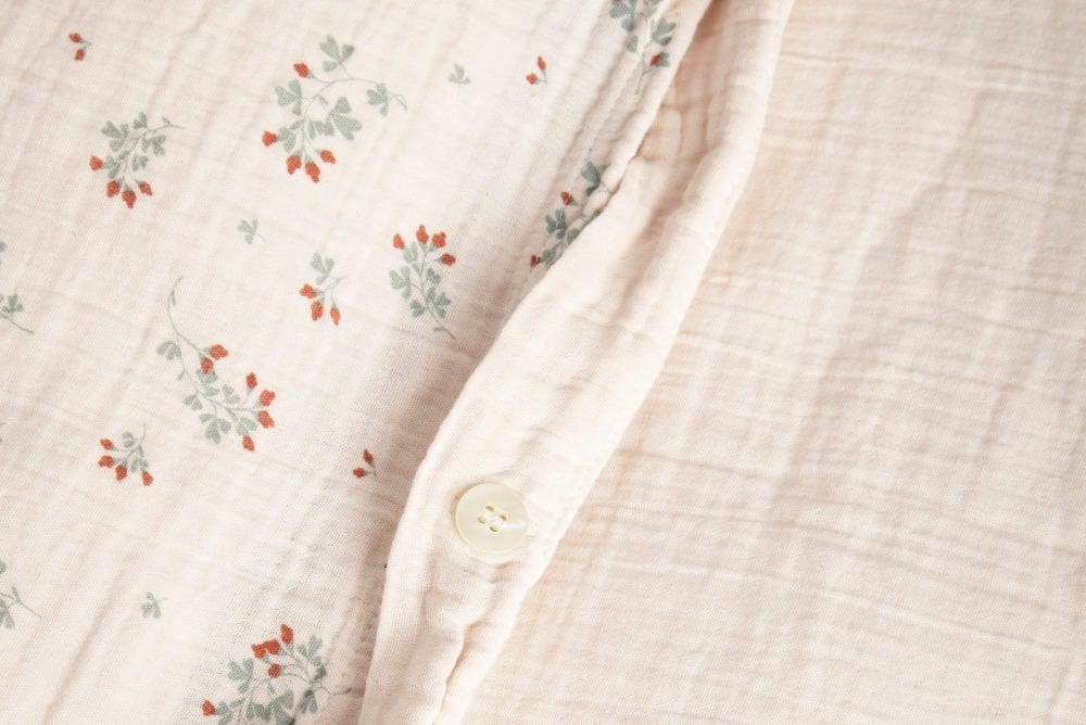Close up cotton bedding with clover pattern